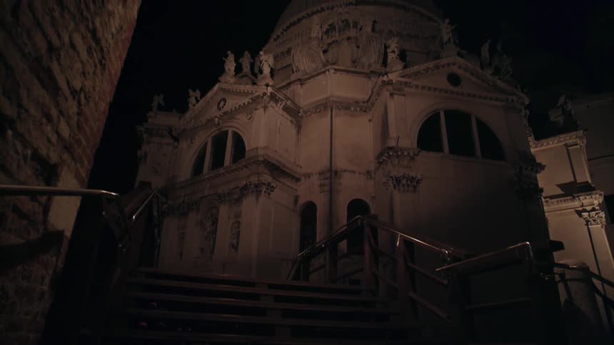 Tall religious building at night