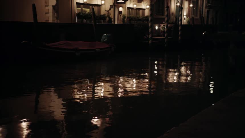 A boat bobs in a pool of water