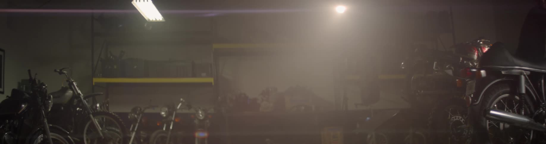 Light shining in a dank garage area