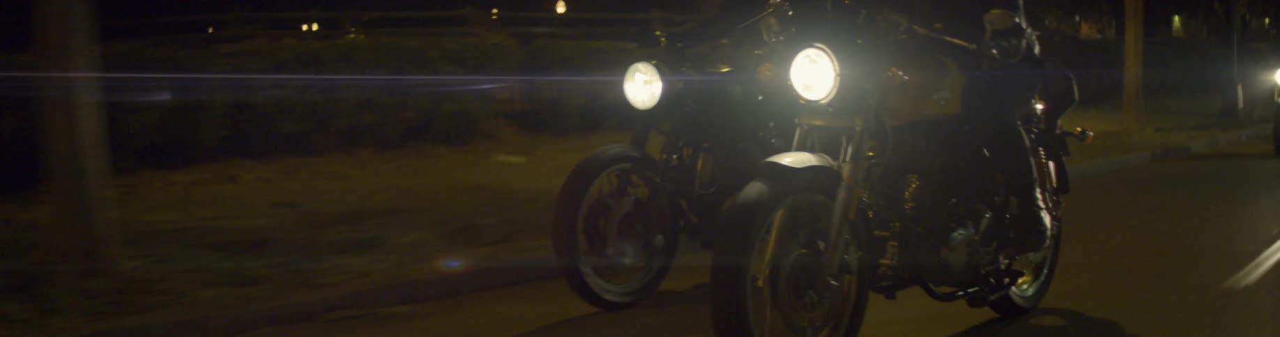 Motorcyclists riding at night