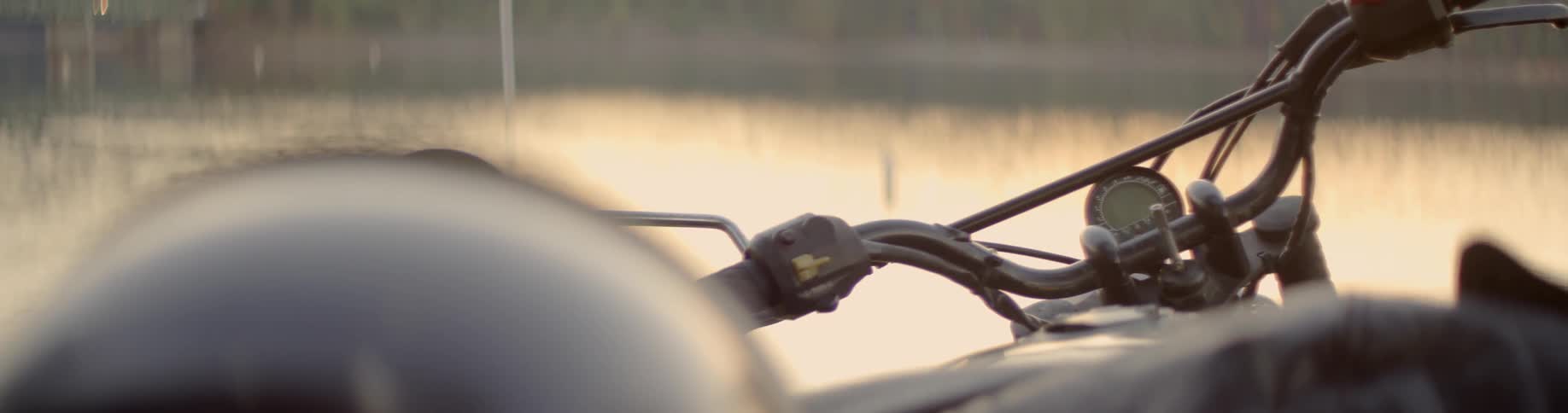 A motorcycle near a body of water