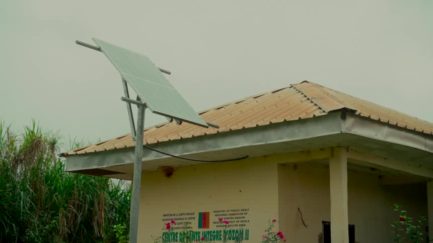 A single solar panel provides sustainable energy for a rural health center in Africa