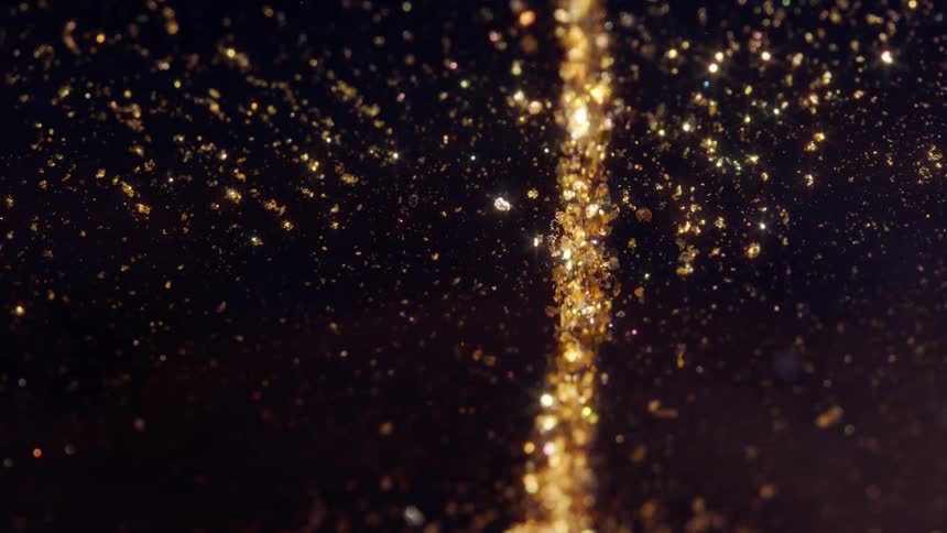 A shimmering river of golden glitter particles flows through a dark and magical space