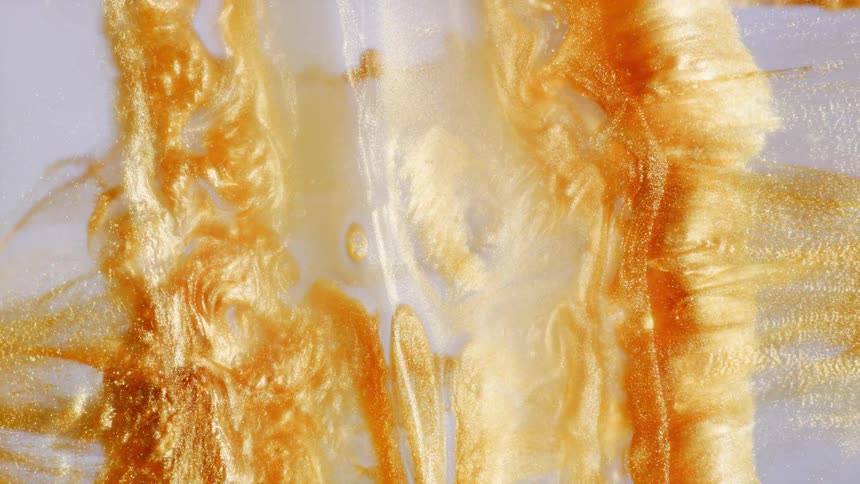 A mesmerizing abstract background of liquid gold swirling and flowing in slow motion