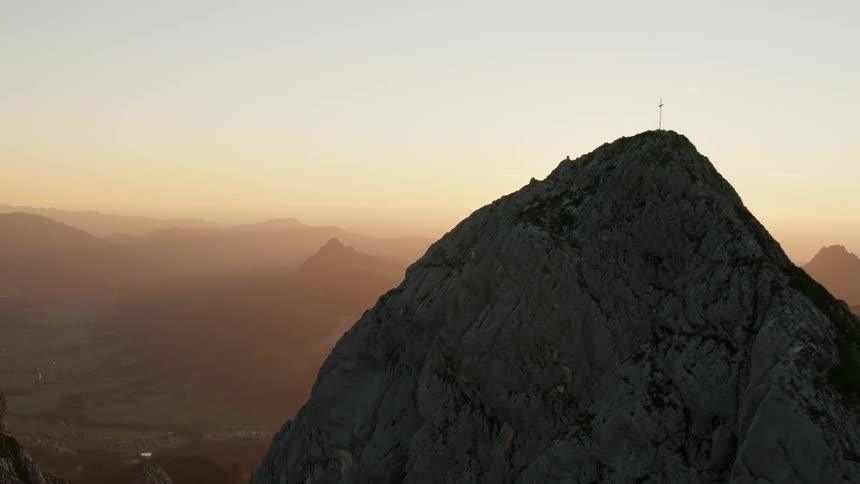 The mountains are high and vast at sunset