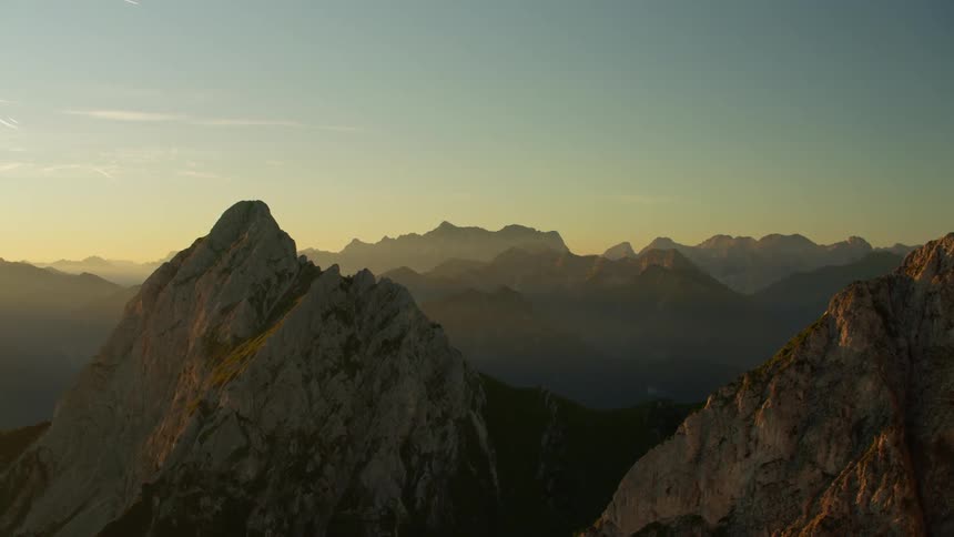 Aerial view of some mountains at sunset