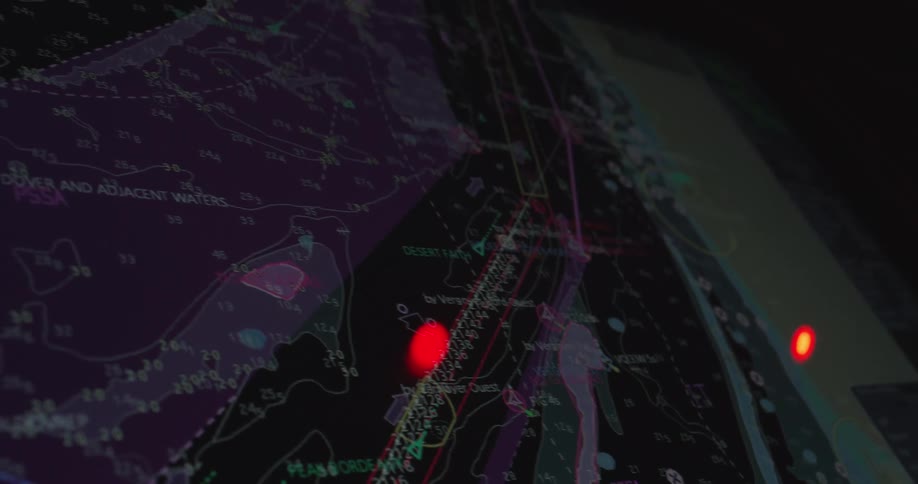 A close-up of a modern maritime electronic chart display and information system tracking a vessel's position