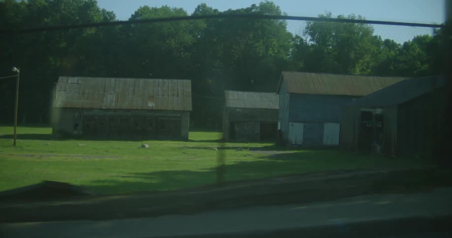 Behind the fence is a farm