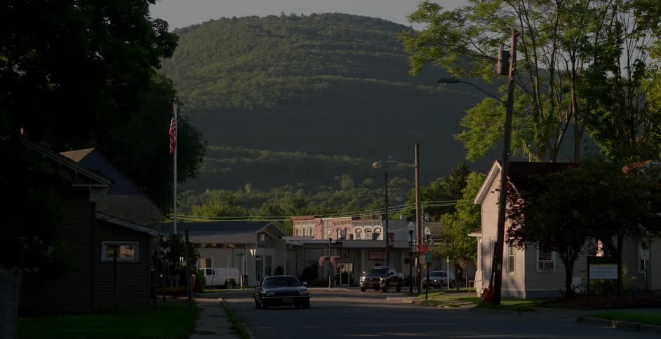 This small town has a tall mountain behind it