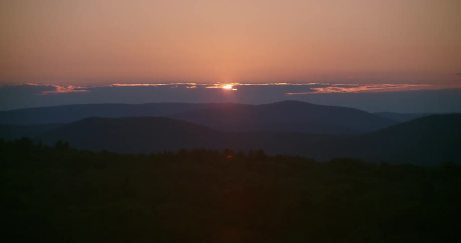 Hilly landscape at sunset