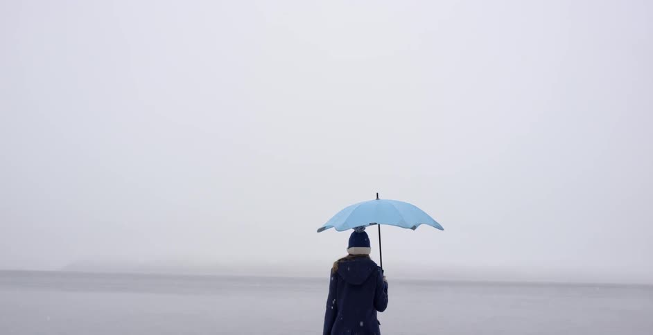 Woman walking in snow