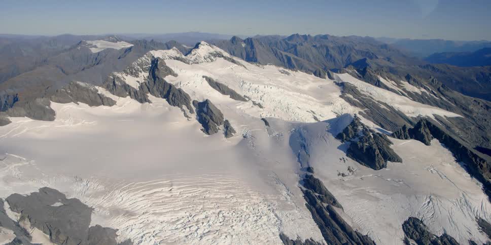 The mountain is covered with ice and snow