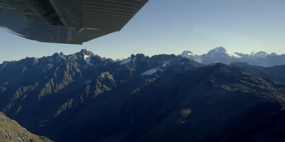 Mountains as seen from a small plane flying past them