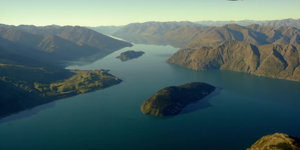 A wide lake near mountains