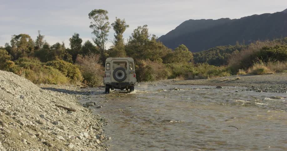 A truck is driving into the stream