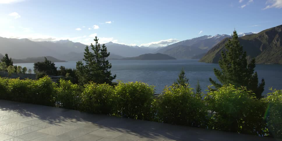 View looking out at a lake and mountains