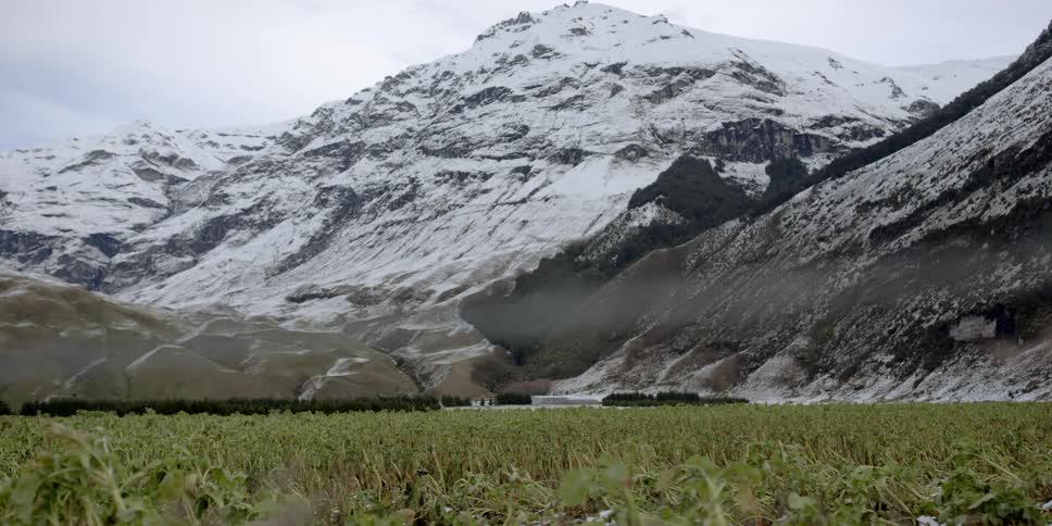 Snow covers a mountain peak