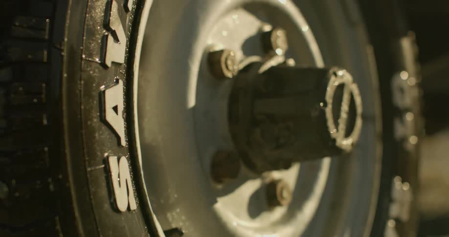 The tires are wet and shining