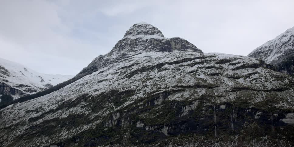 Snow covered mountains on a cloudy day