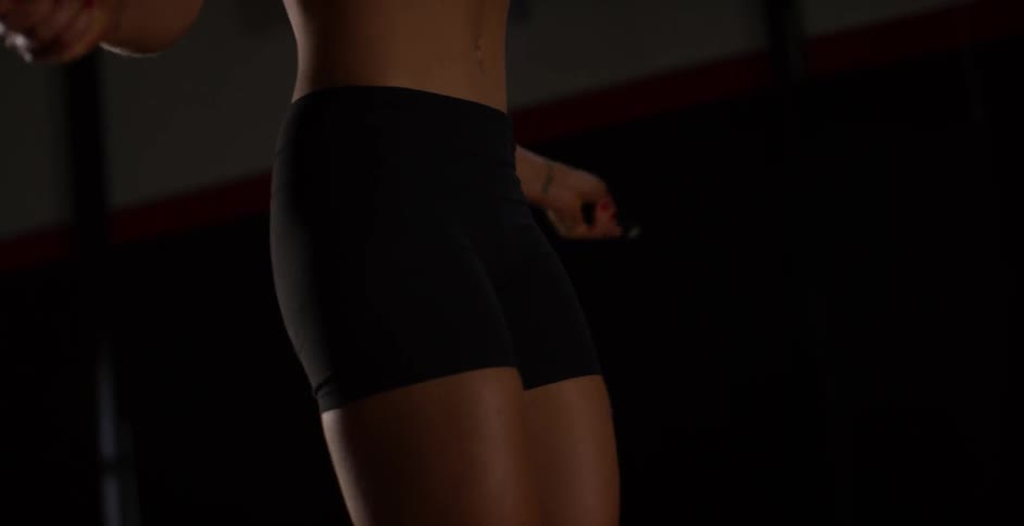 A woman is jumping rope