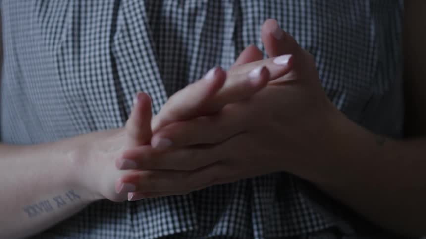 A person is rubbing their hands together
