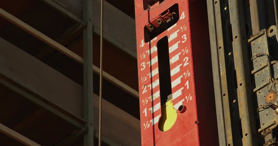 A machine slowly drops it's peg down