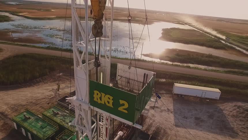Heavy machinery is shown outside on a sunny day