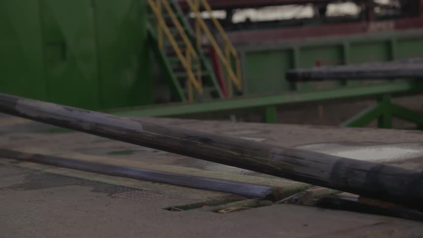 Machine slides down a piece of metal