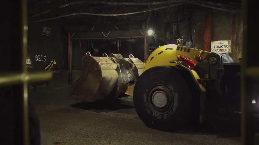 A plow moves into a tunnel