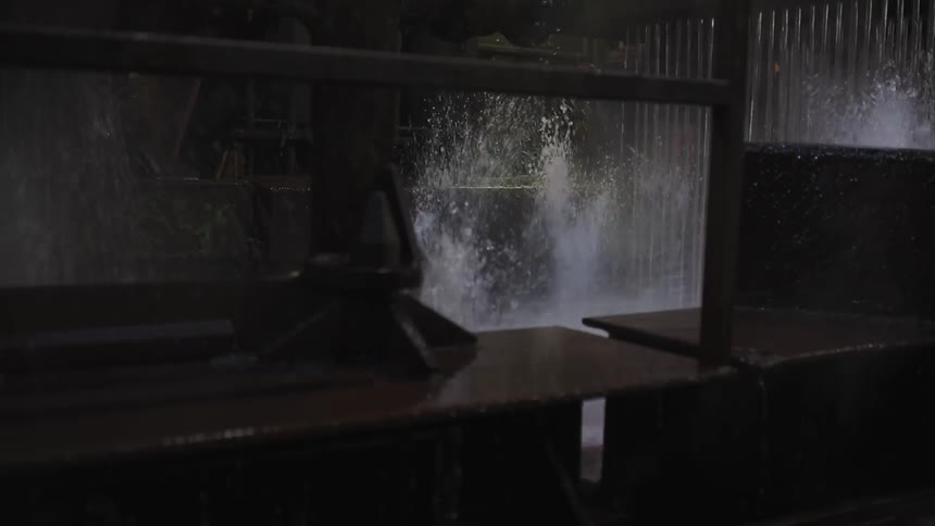 Water is flooding the interior of an office