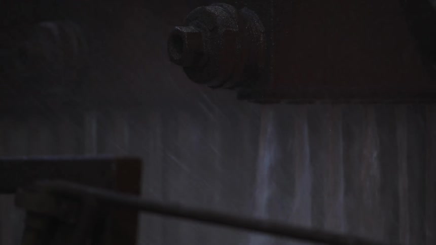 The machine is spraying water below