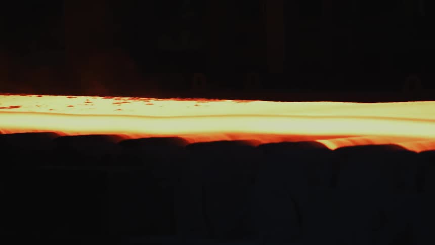 A molten metal sheet is rolled through a production line
