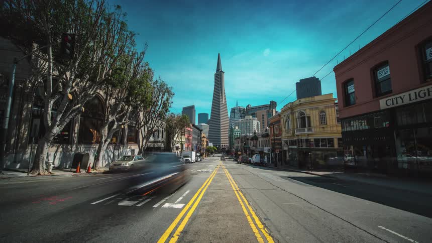 The busy streets have vehicles going both ways
