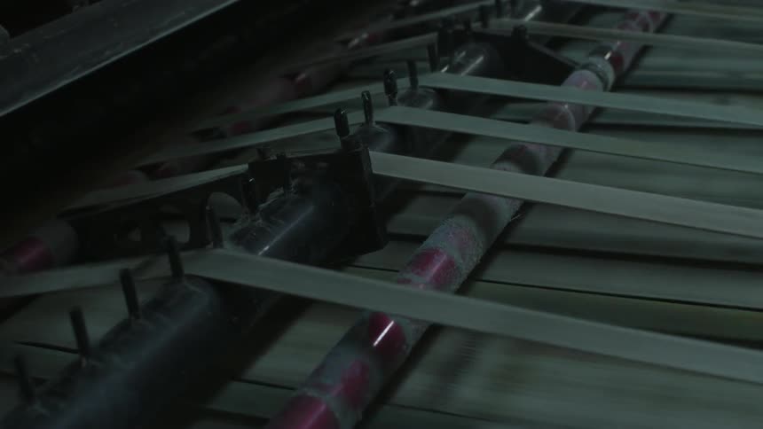 Machine running tape quickly through it