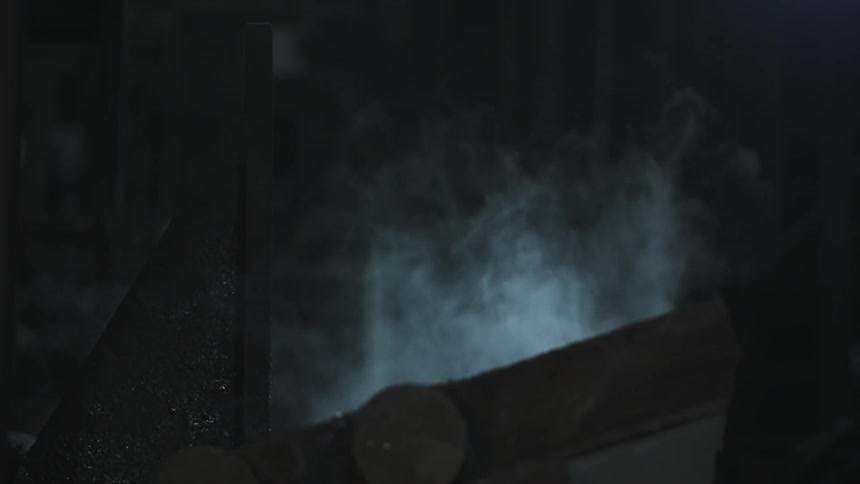Steam rises from a piece of equipment