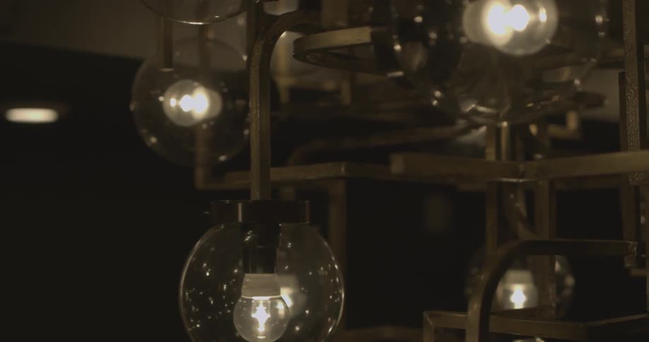 The bulbs are circular and hanging around