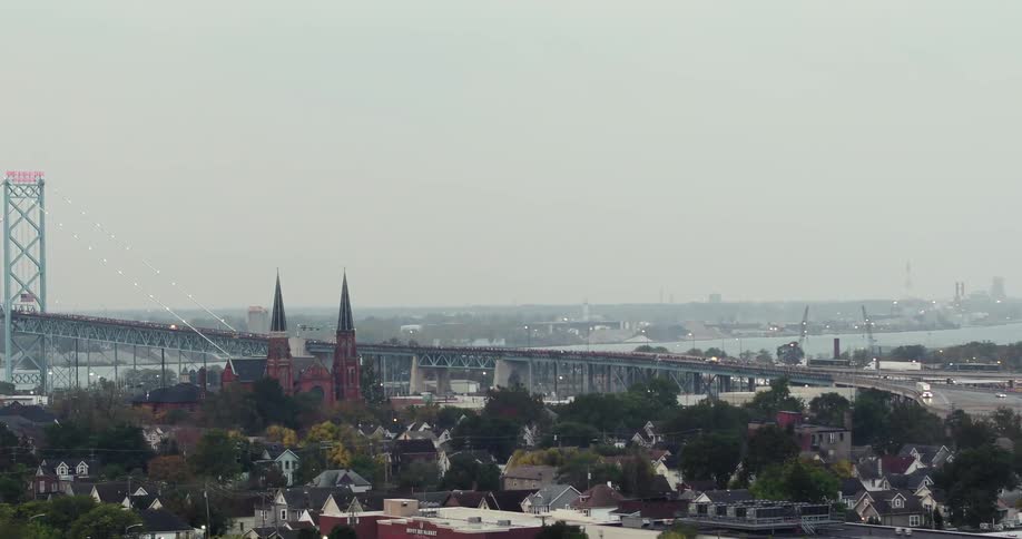 A large bridge goes out from the city