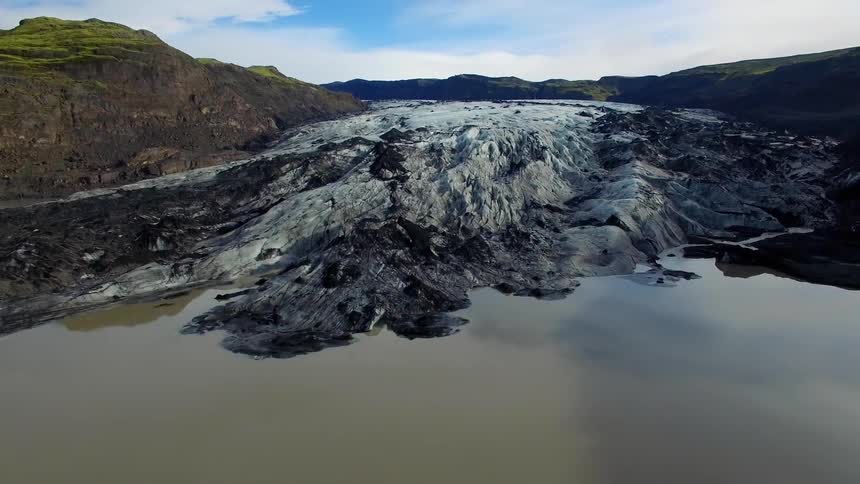 The coast has ice and grass