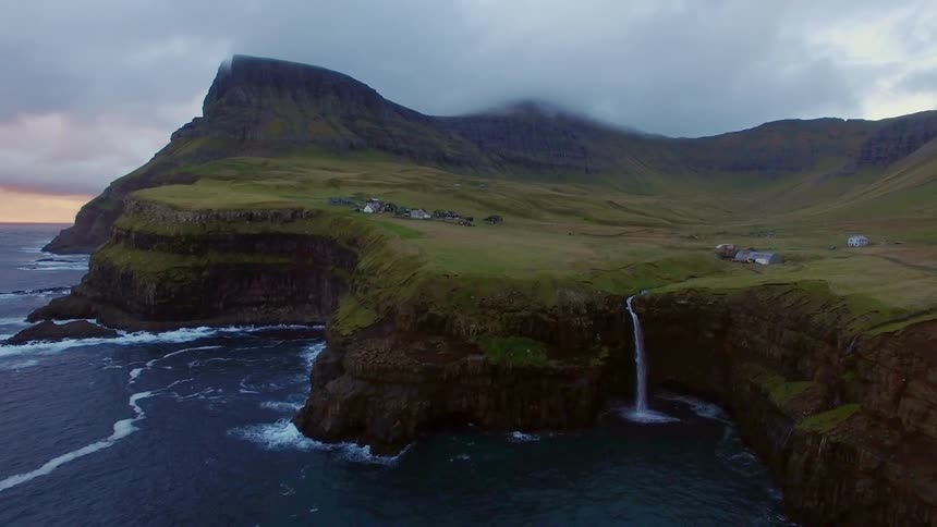 The cliffs are lined with crashing waters
