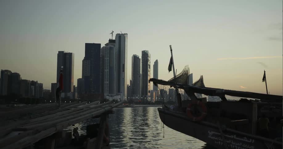 River in front of a large city with skyscrapers