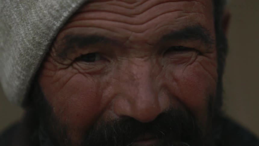 Close up of a man's wrinkled face