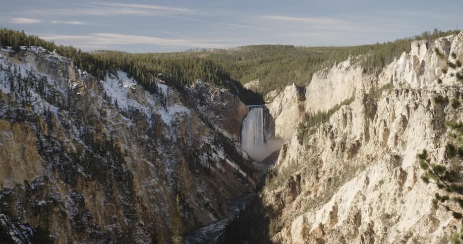 The mountain has some ice and snow on top