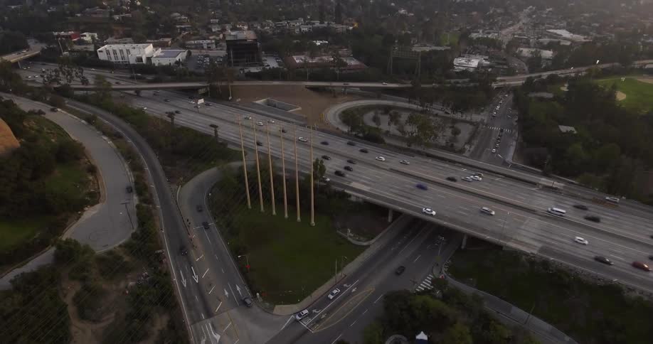 The highway is busy with many cars