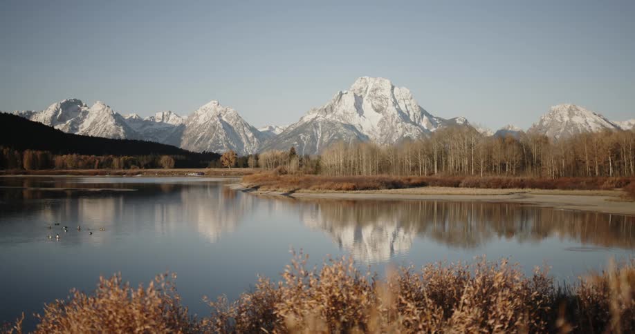 The lake is calm and reflective