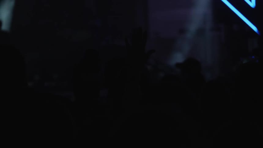 Lights flash at a concert
