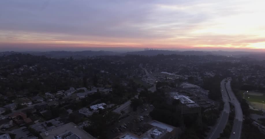 The town below is peaceful at dawn