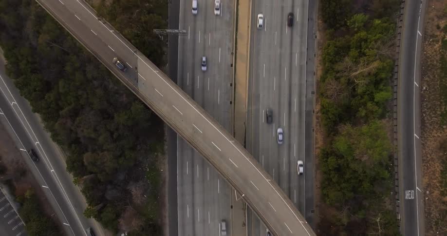 Cars drive in all directions on this interstate
