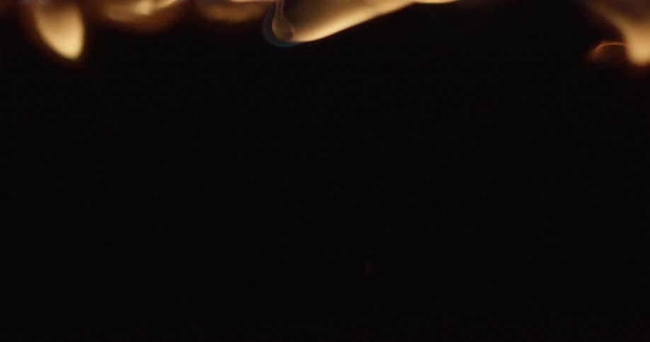 Flames burning and water dripping