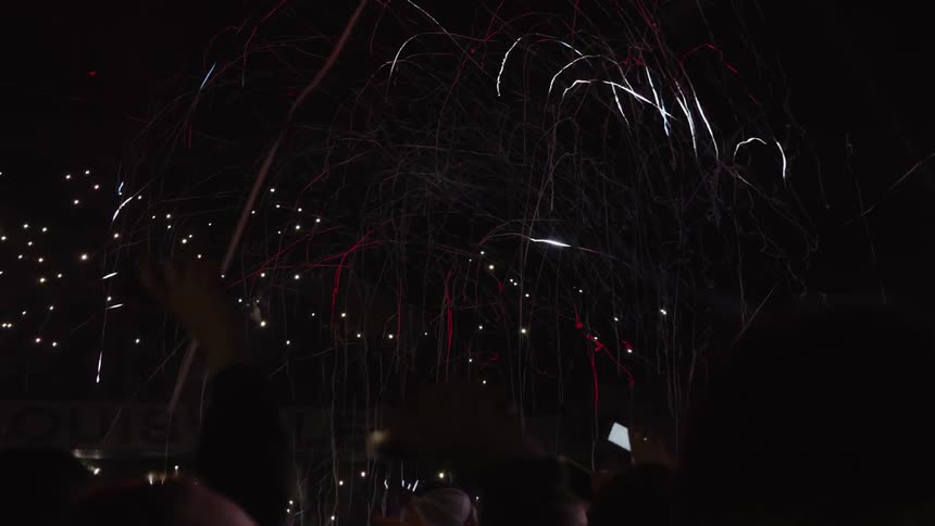 Streamers fly through the air at a concert