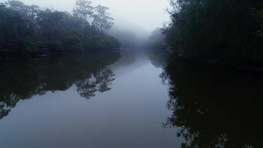 The canal is covered with fog ahead